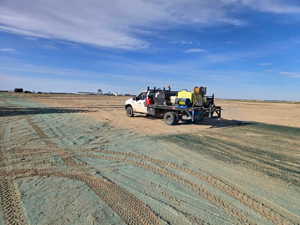 Booming large pad with herbicide